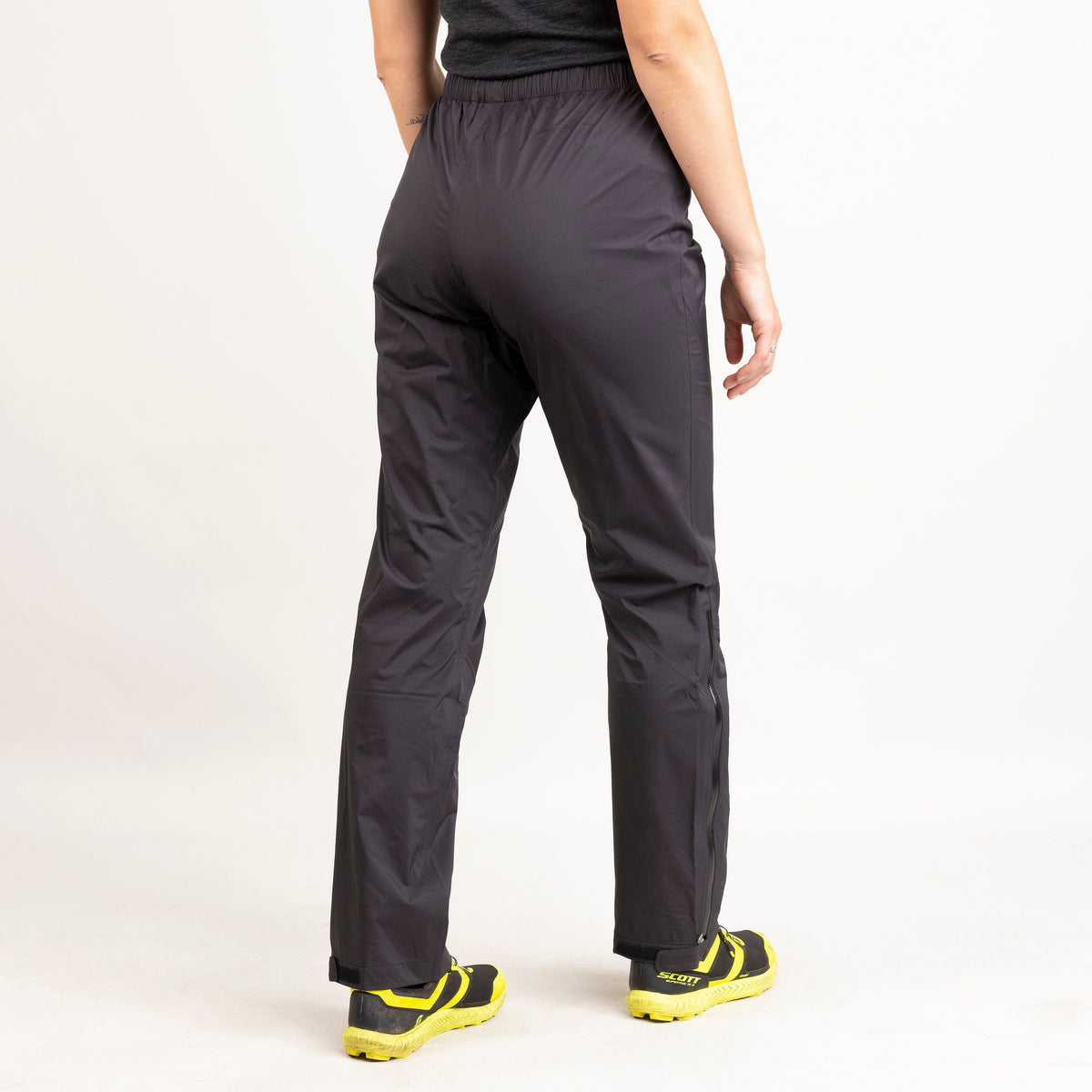 womens alpkit parallax waterproof trousers in black back