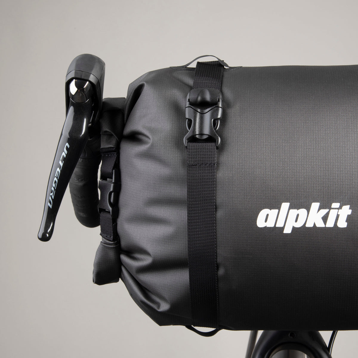 alpkit deluge handlebar bag 20L for bikepacking buckle