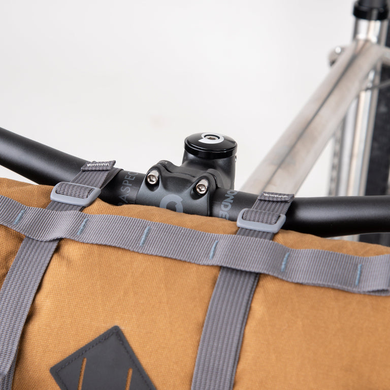 alpkit kuoka handlebar bag for bike packing in mountain brown top