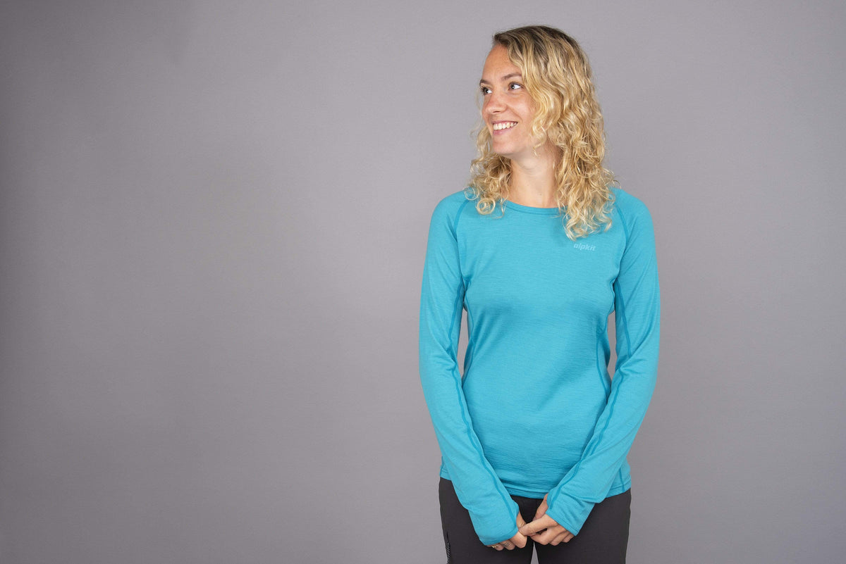 womens Kepler long sleeve merino baselayer in surf front