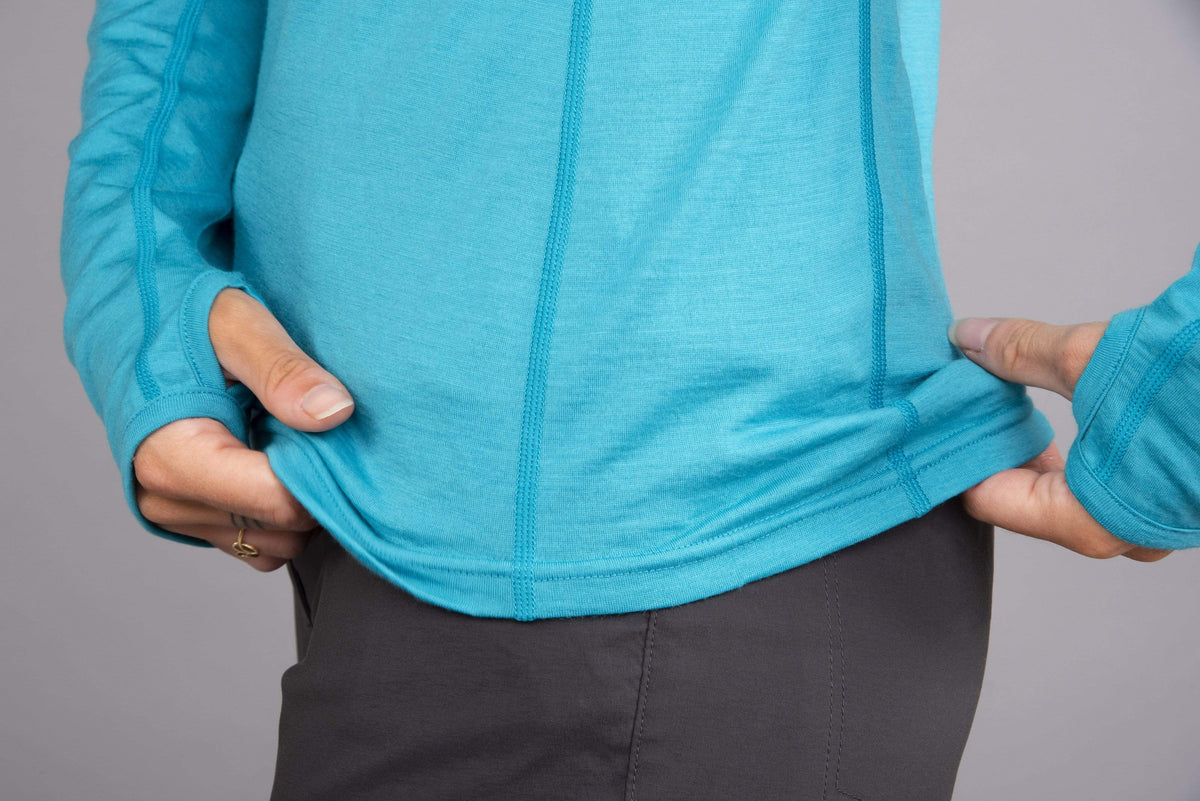 womens Kepler long sleeve merino baselayer in surf hem