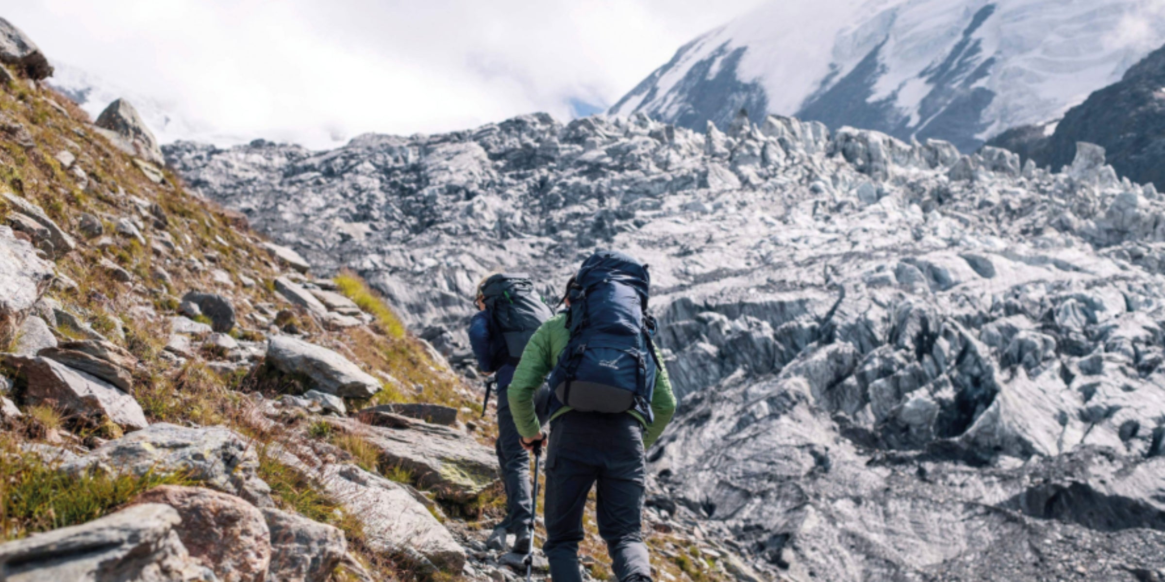 Backpacking in the Alps with a loaded rucksack