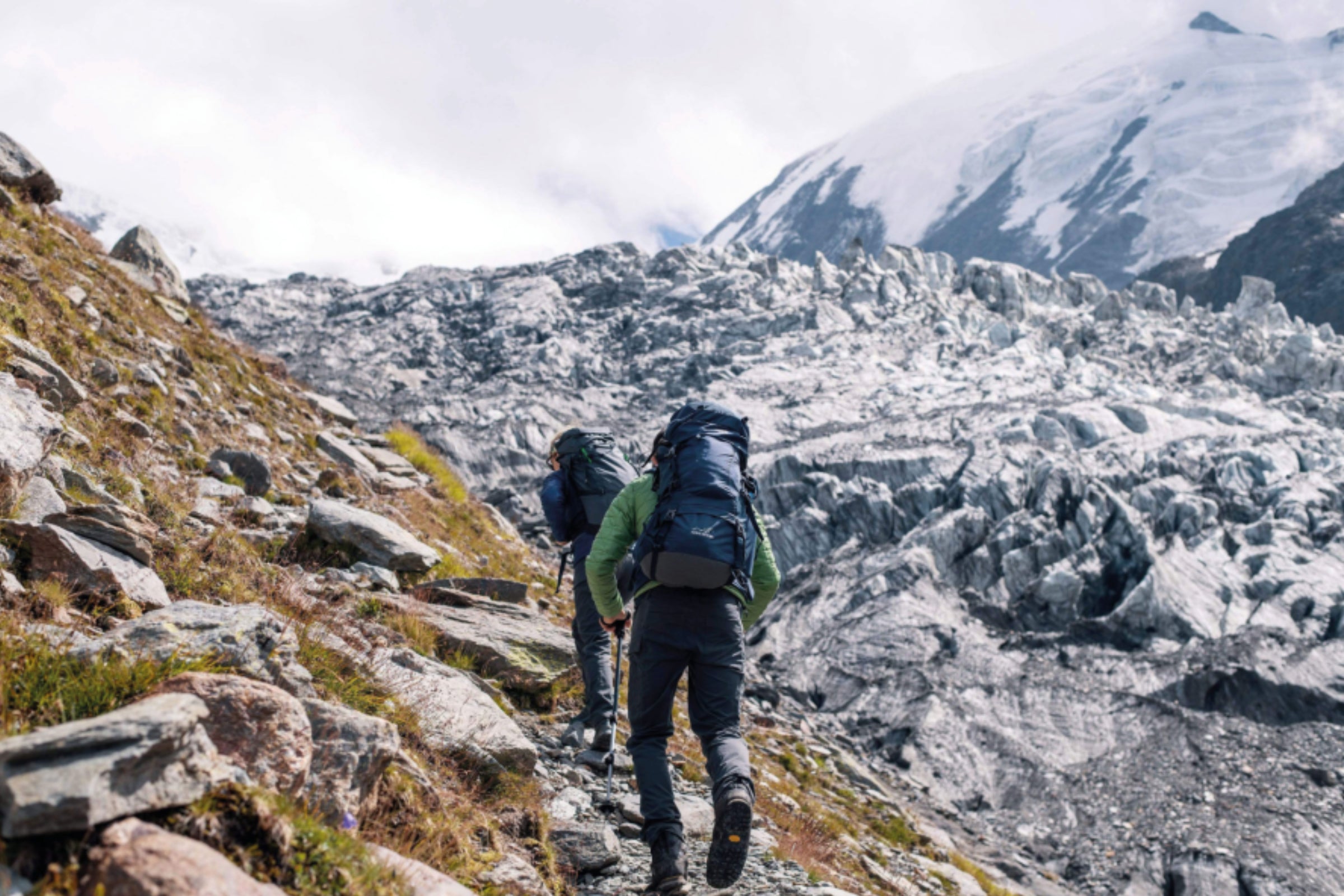 Backpacking in the Alps with a loaded rucksack