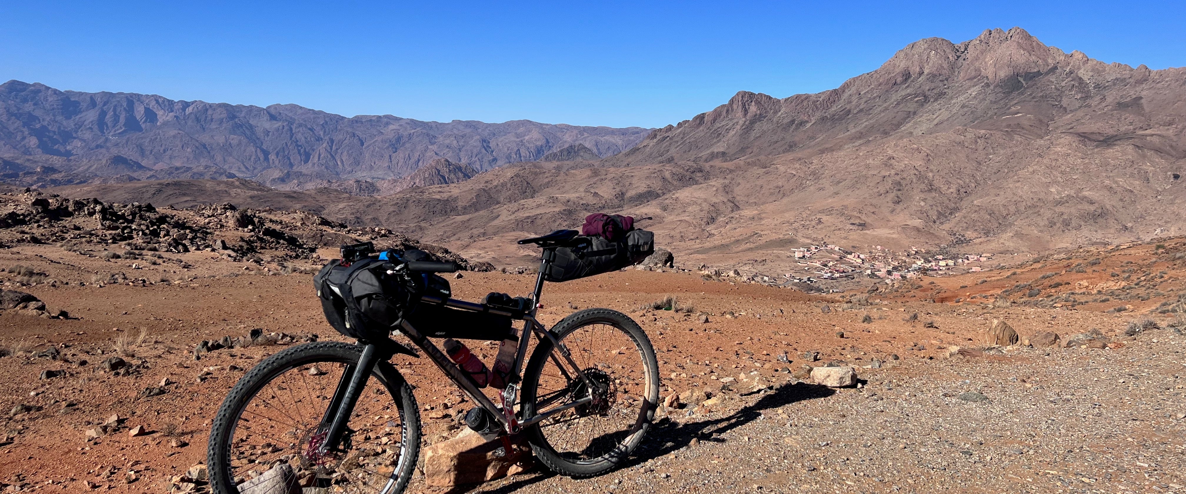 Titanium hardtail mountain bike with bike luggage