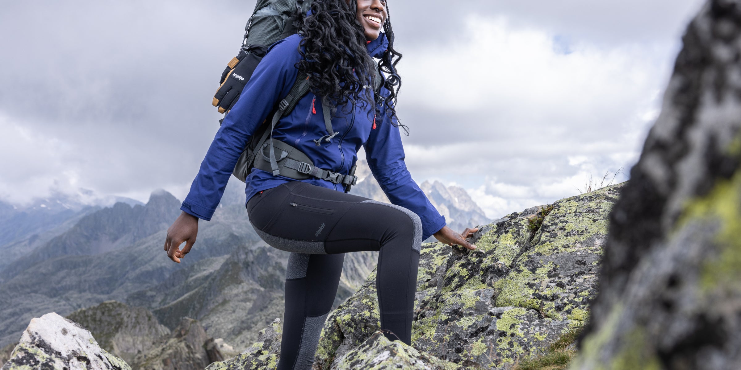 Woman climbing in the Alps