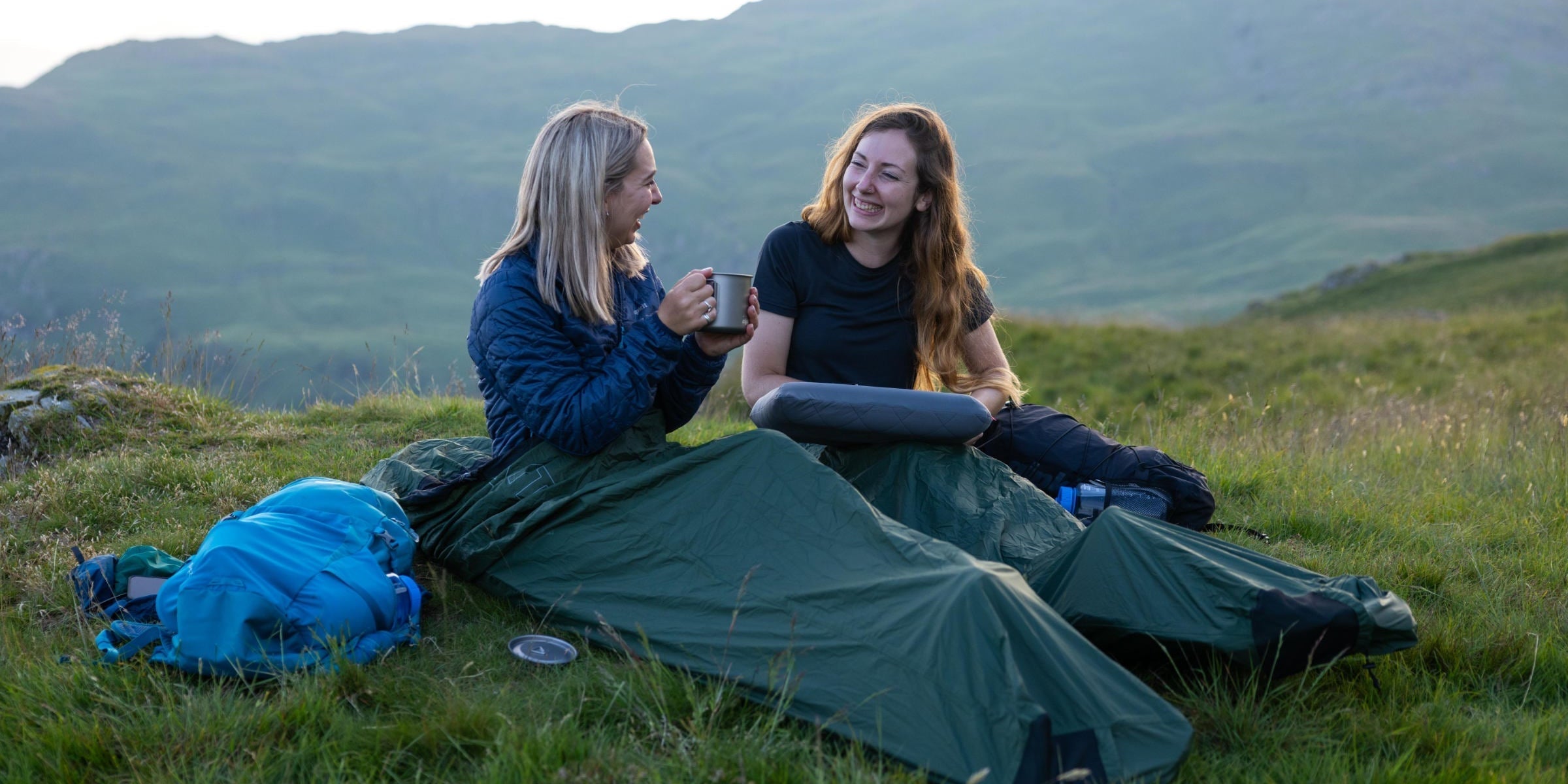Two women bivvying in the Lake District