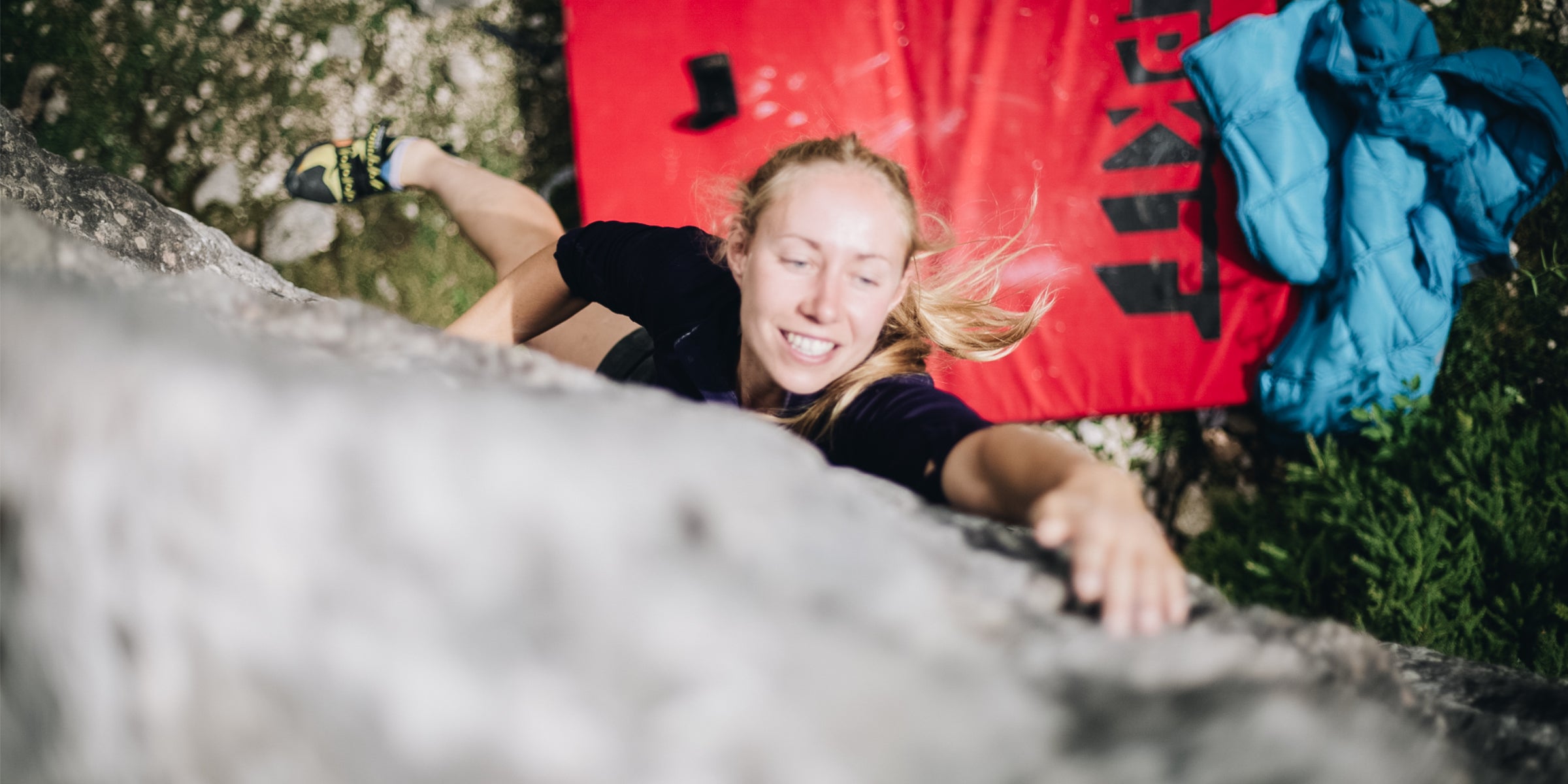 Climbing above a bouldering mat