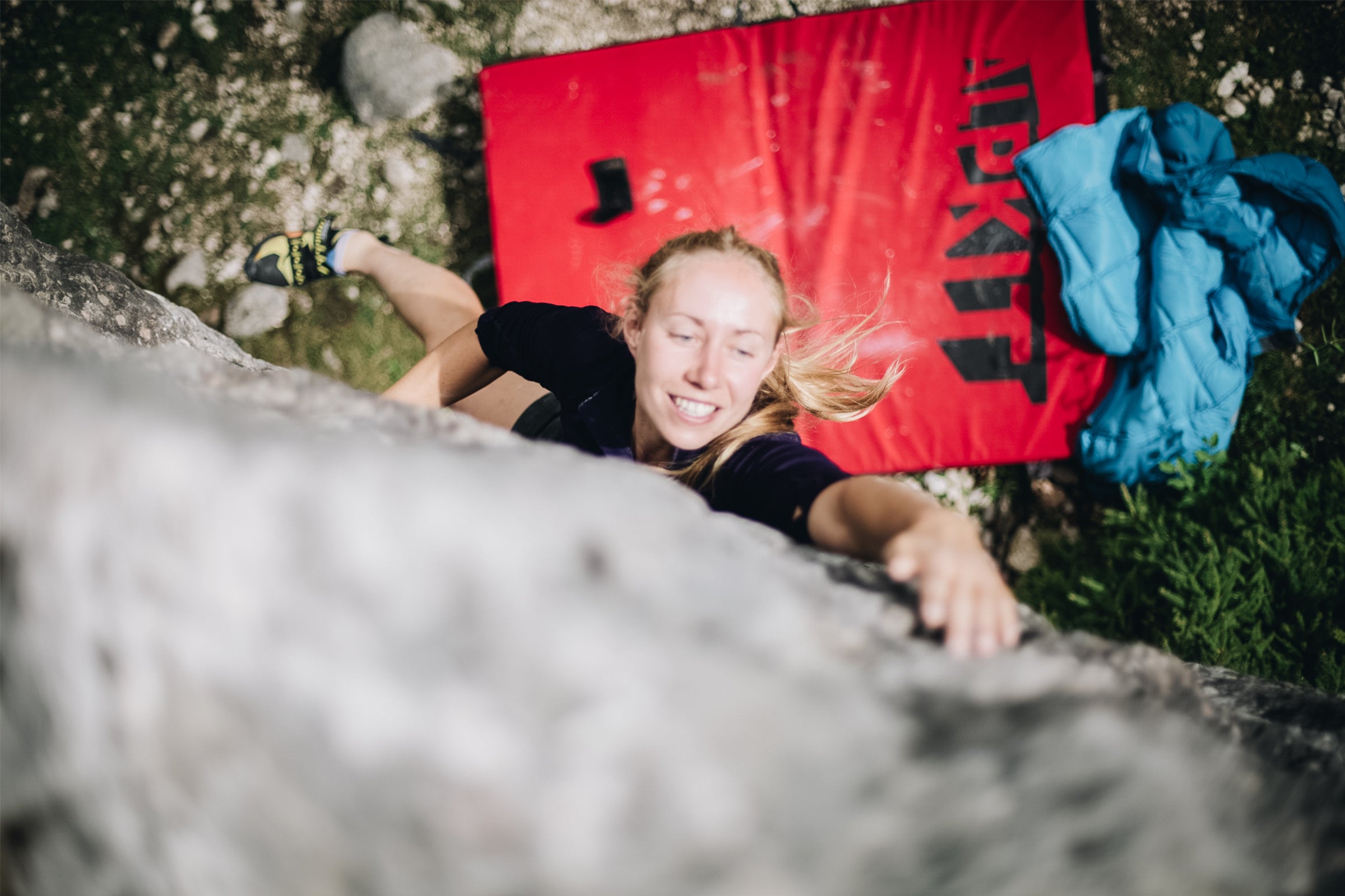 Climbing above a bouldering mat