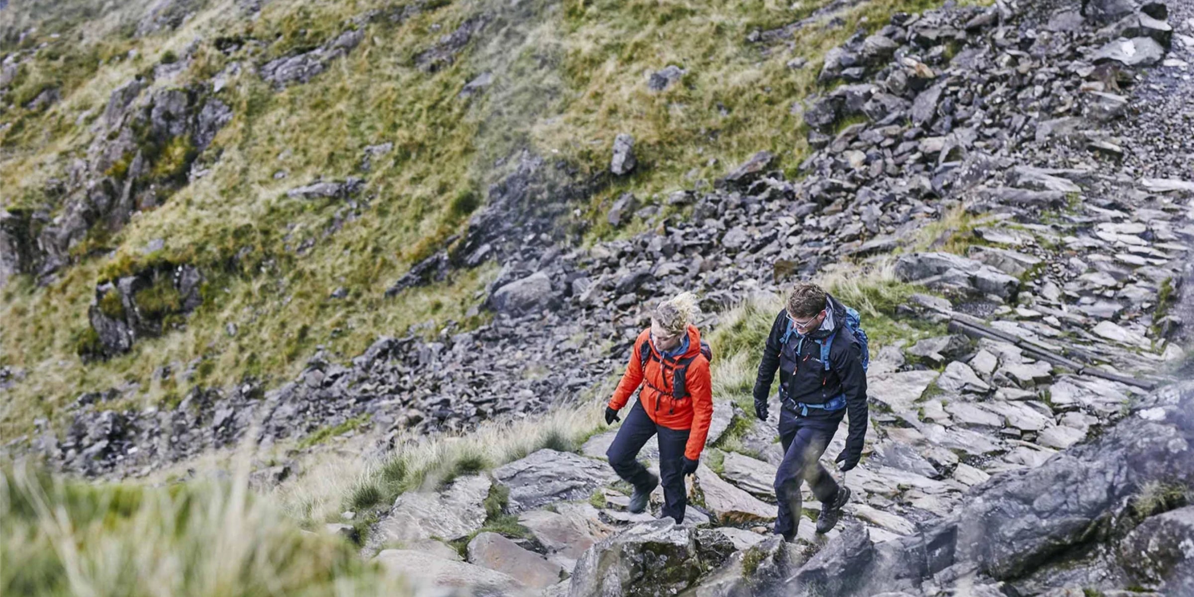 Hiking in rain wearing Nautilus waterproof trousers