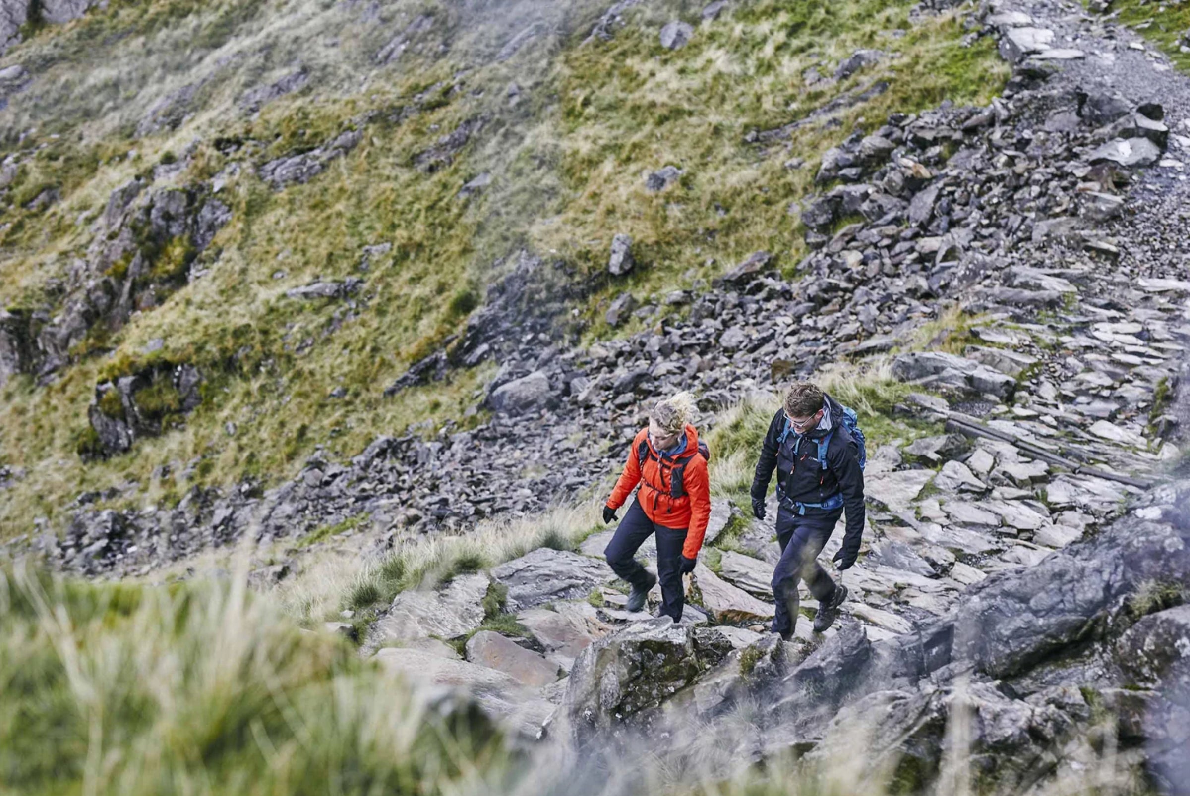 Hiking in rain wearing Nautilus waterproof trousers