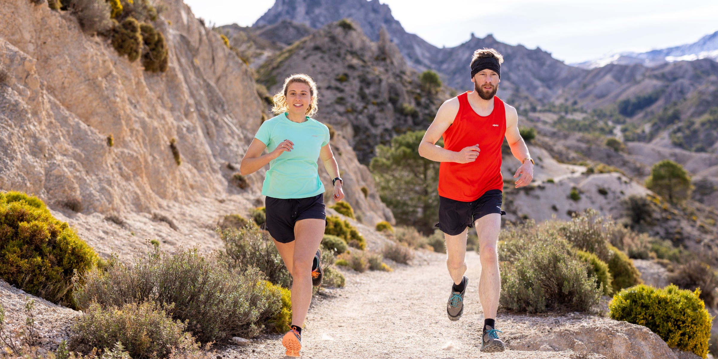2 Trail runners wearing base layers in hot weather 