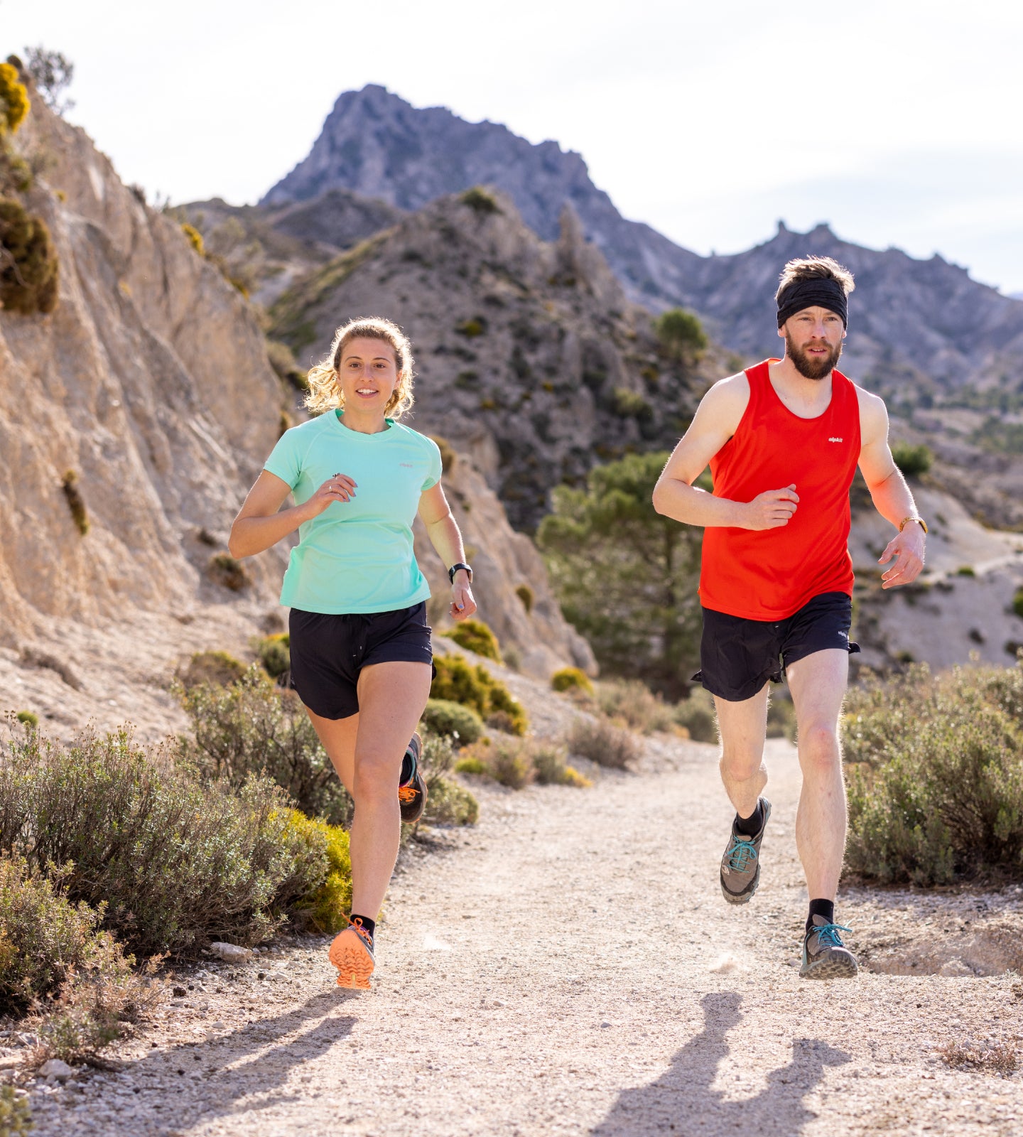 2 Trail runners wearing base layers in hot weather 