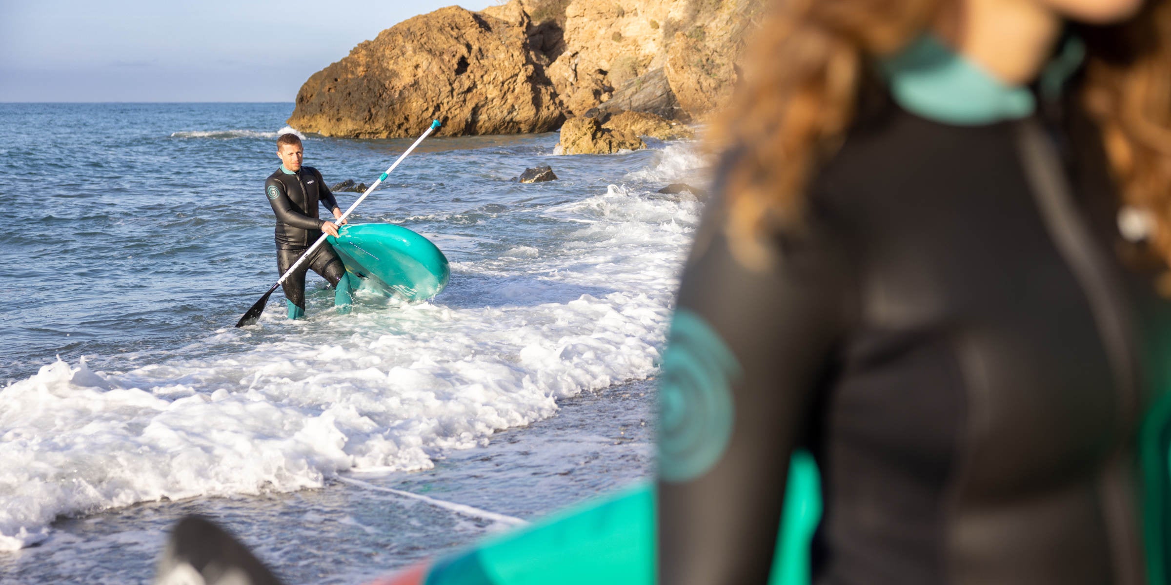 Stand-up paddleboarding in the ocean