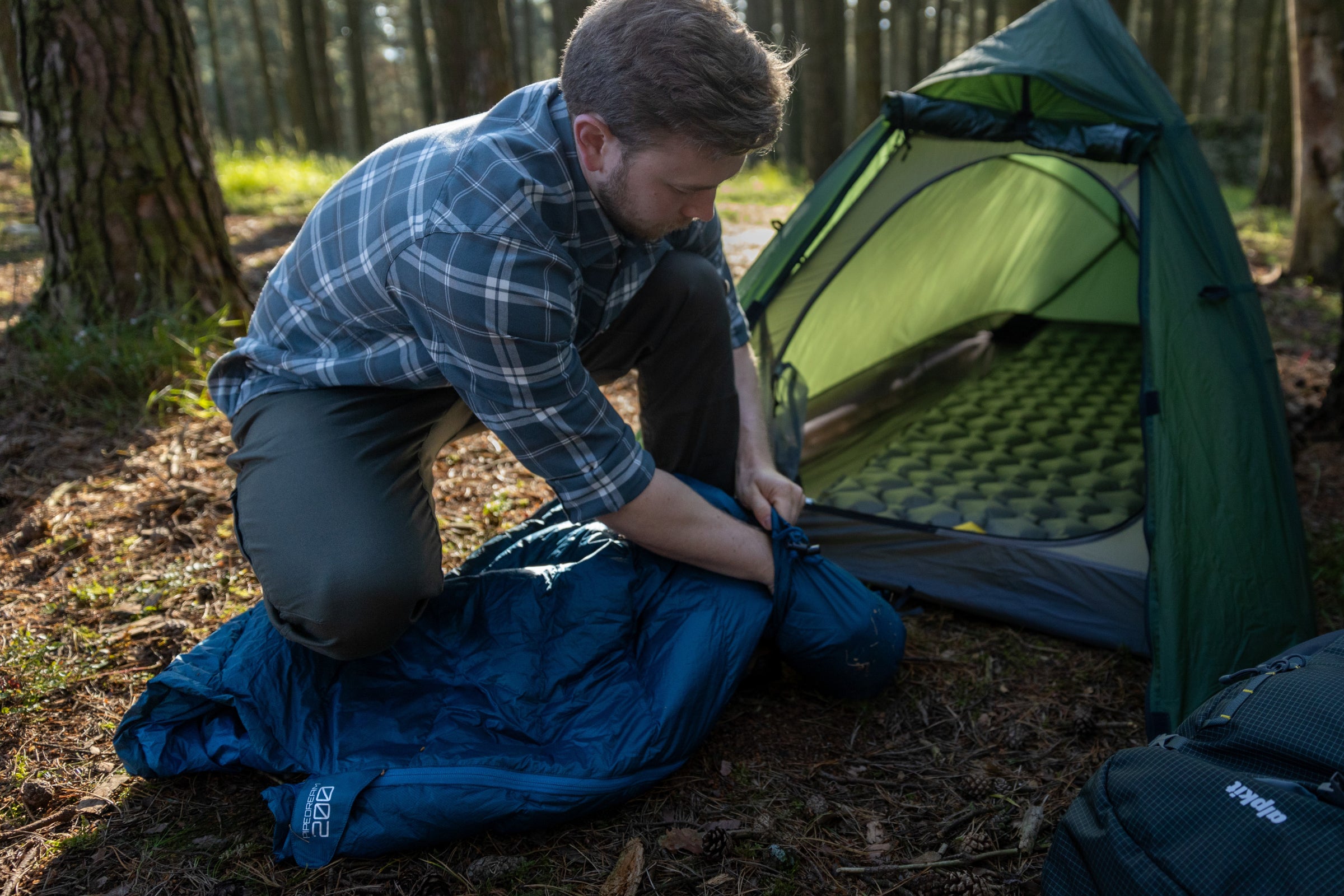 Compressing a compact lightweight summer sleeping bag
