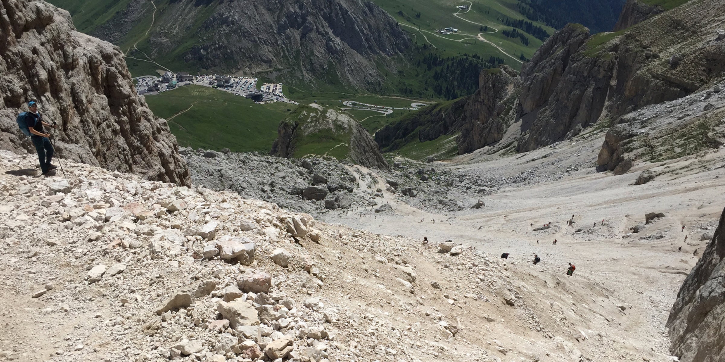 Using trekking poles on steep Alpine terrain