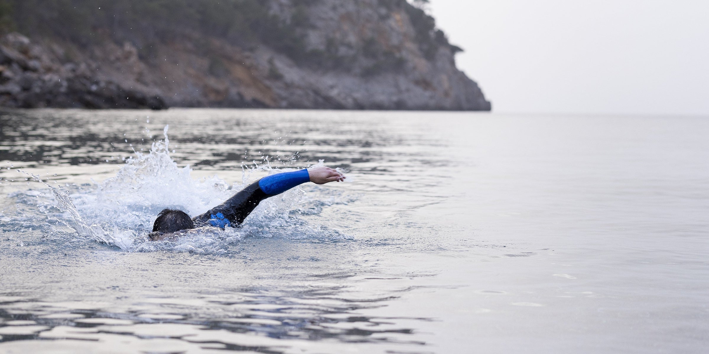 Outdoor swimming wetsuit designed for unrestricted arm movement