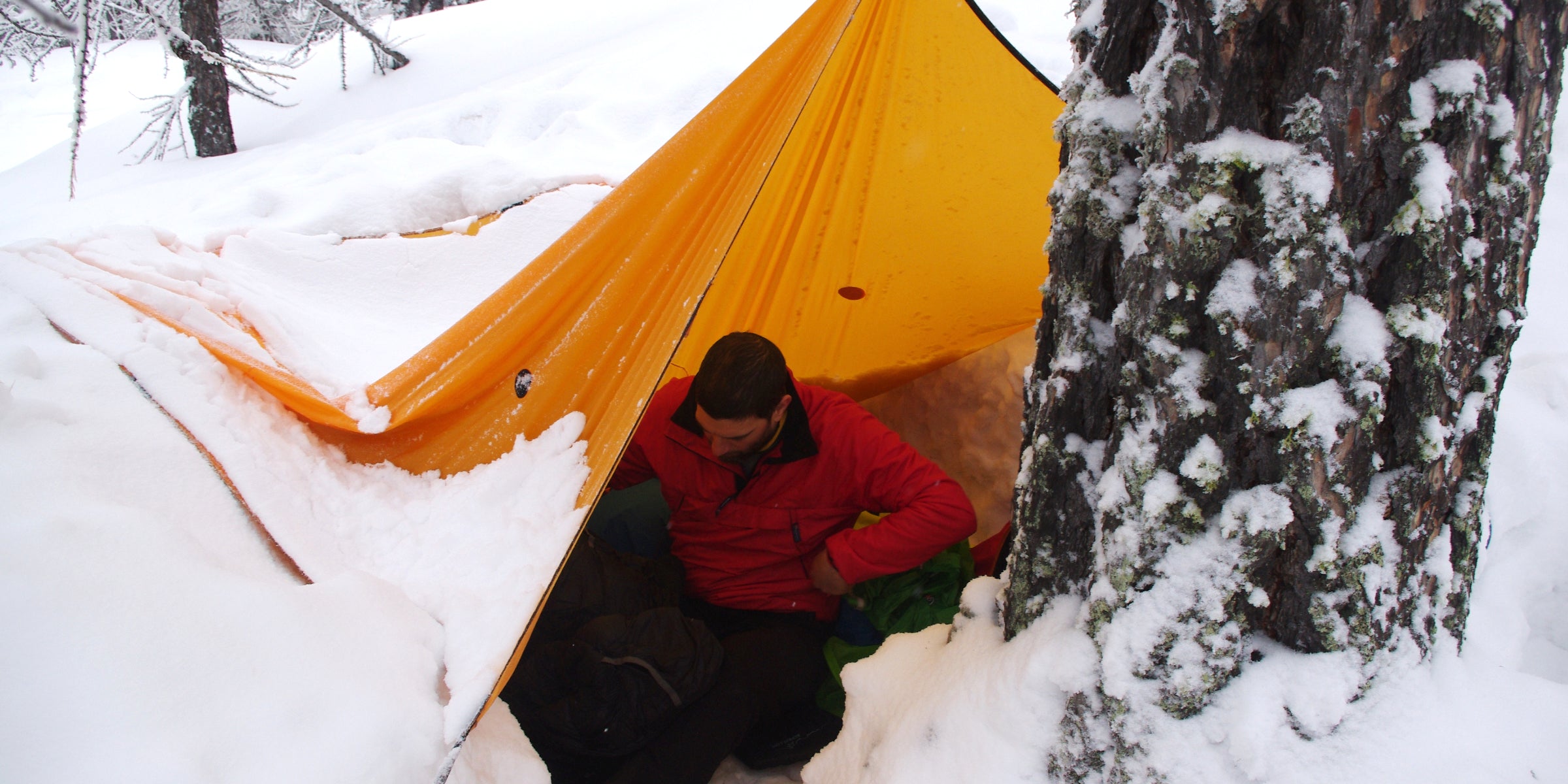 Bivvying under a tarp in snow