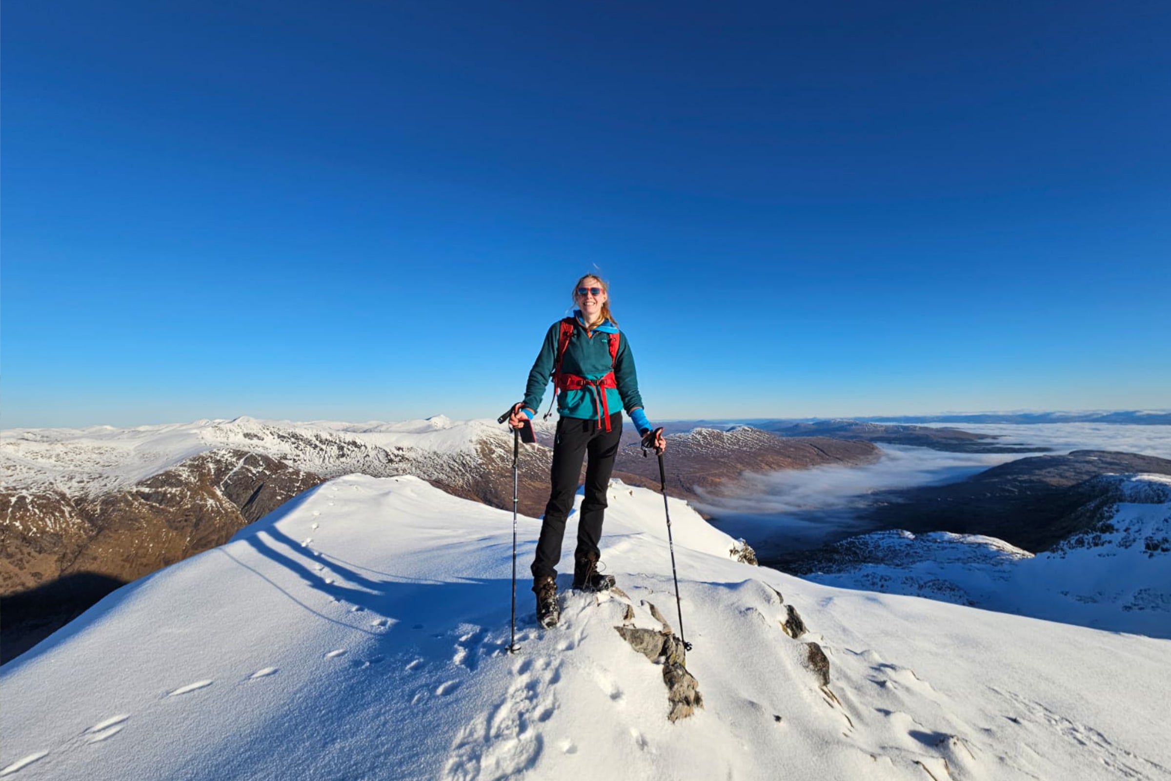 Anna Wells summiting during her winter munro challenge