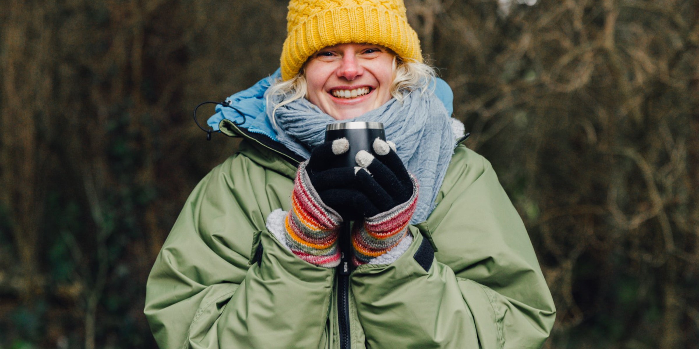 Winter outdoor swimmer dressed in dry robe