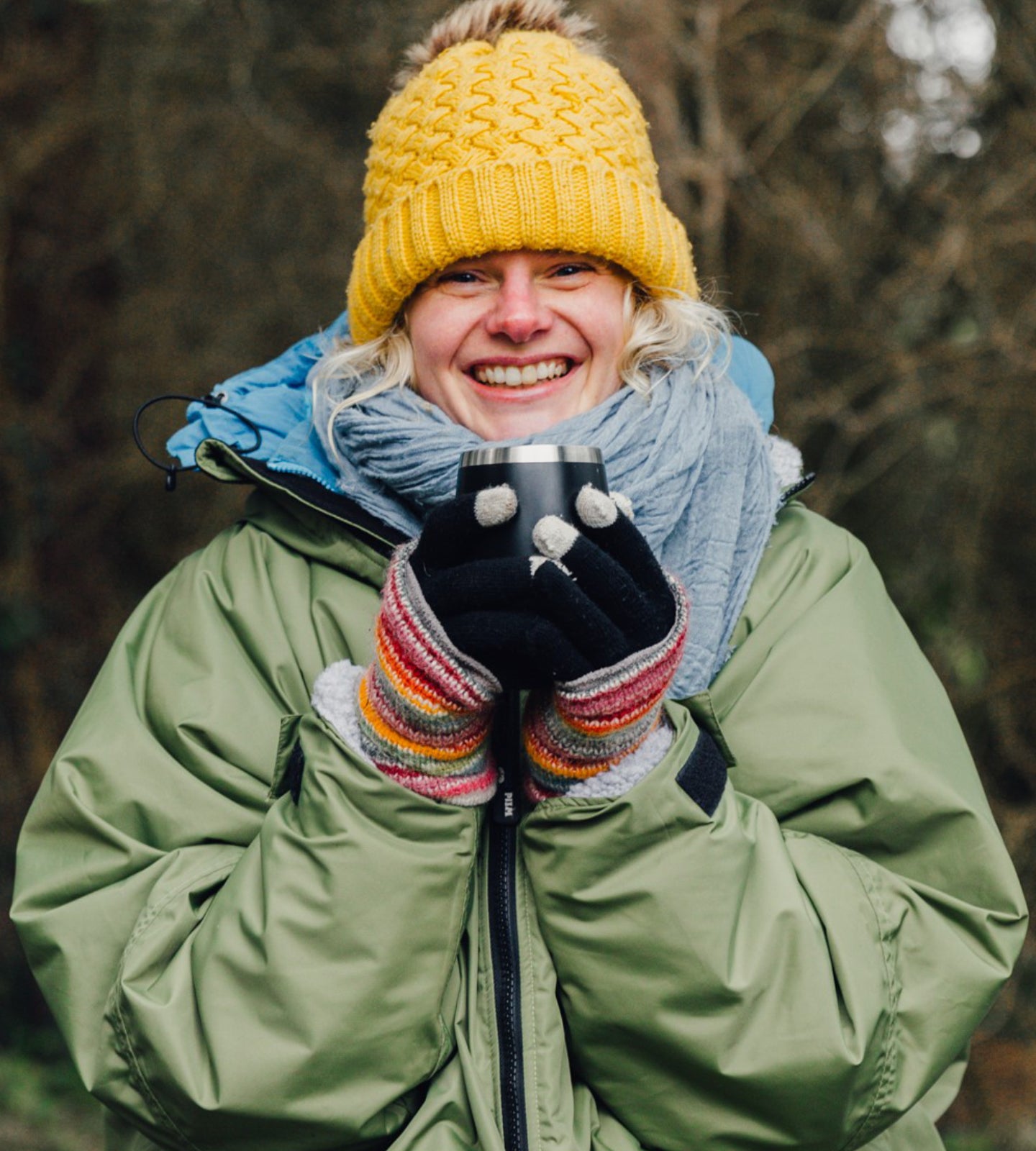Winter outdoor swimmer dressed in dry robe