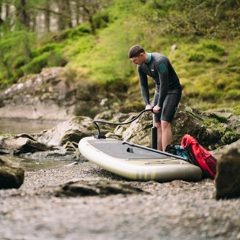 Alpkit Delta stand up paddleboard in Forest being inflated