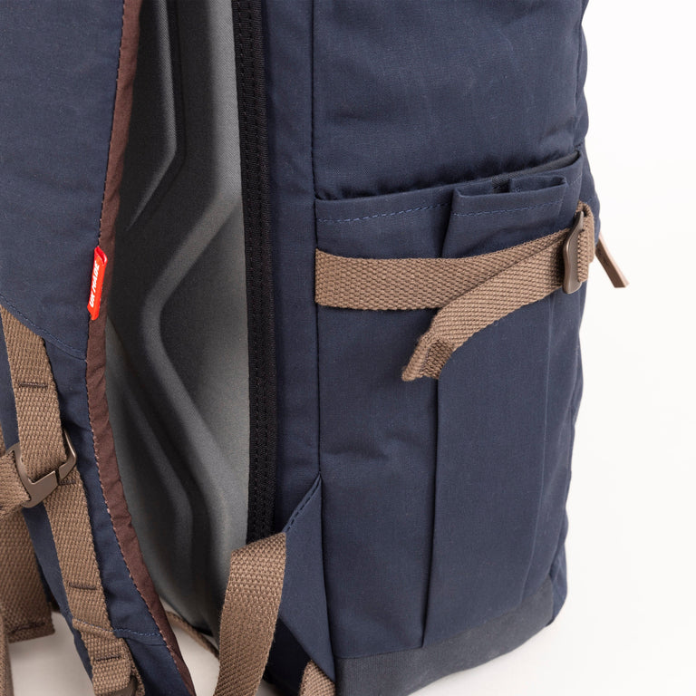 alpkit brevent backpack in navy bottle pocket