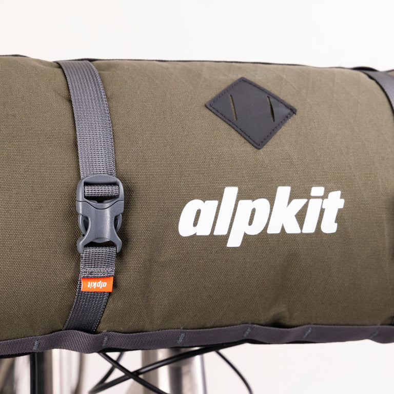 alpkit kuoka handlebar bag for bike packing in olive green logo