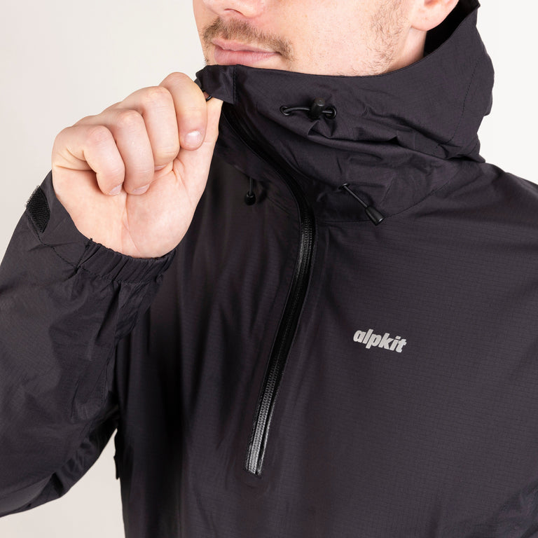 Alpkit men's Pulsar smock waterproof pullover jacket in Black half zip