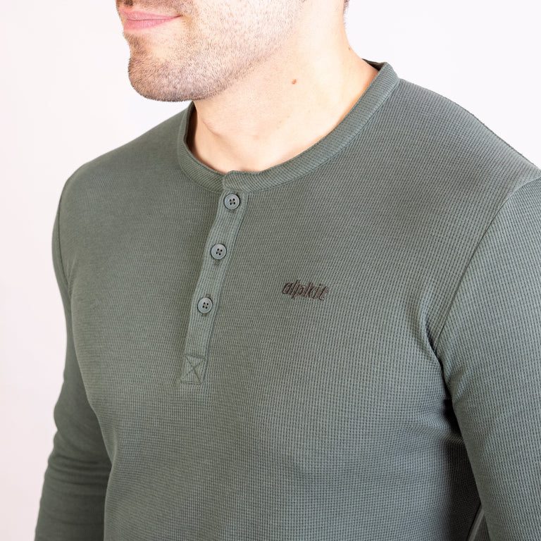 Alpkit mens rivo henley top in alder green logo 