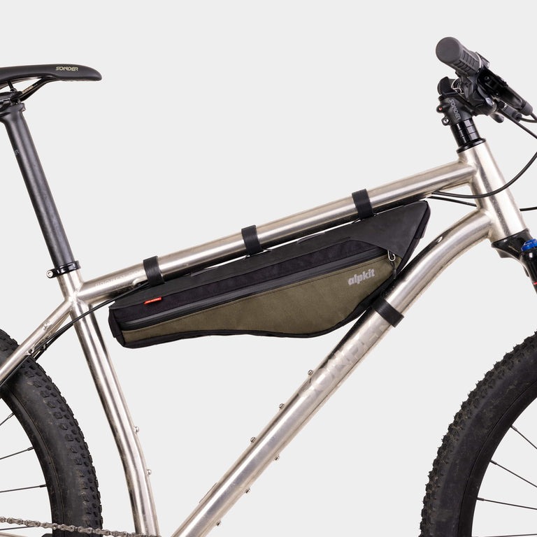 alpkit possum frame bag for bikepacking in olive green