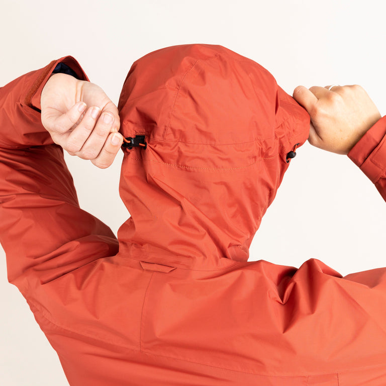 Alpkit women's Atalanta waterproof jacket in Brick red hood