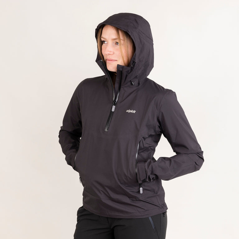 Alpkit women's Pulsar waterproof smock jacket in black hood