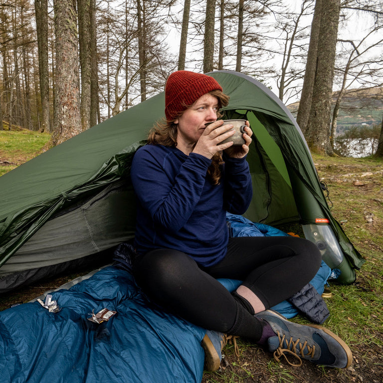 Jenny Graham bikepacking with an Aeronaut bikepacking tent and a PipeDream 400 ultralight down sleeping bag - action - closed