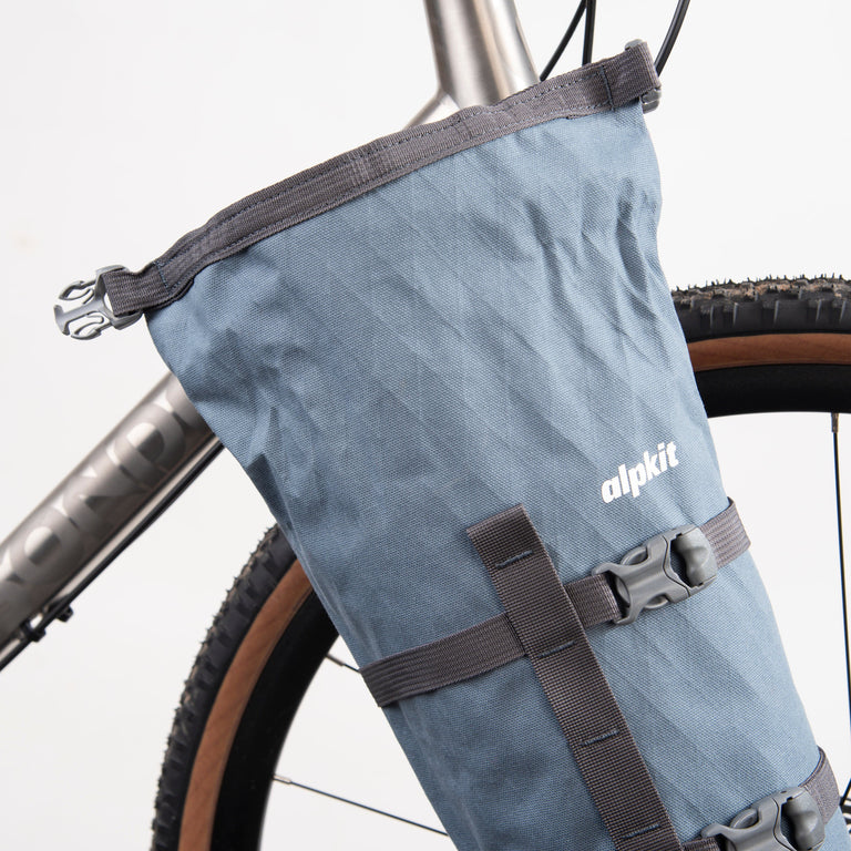 alpkit belongs fork cage bikepacking bag in storm grey roll top - closed