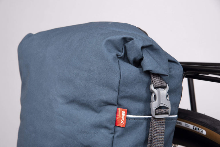 Alpkit caledonian 10 pannier bag in denim buckle - closed