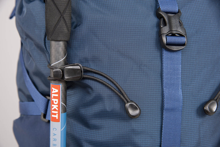 Alpkit Ledge 35l pack in nemo hood internal trekking pole loops - closed