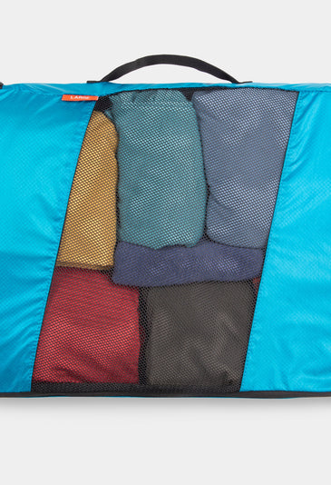 alpkit packing cube large in blue packed