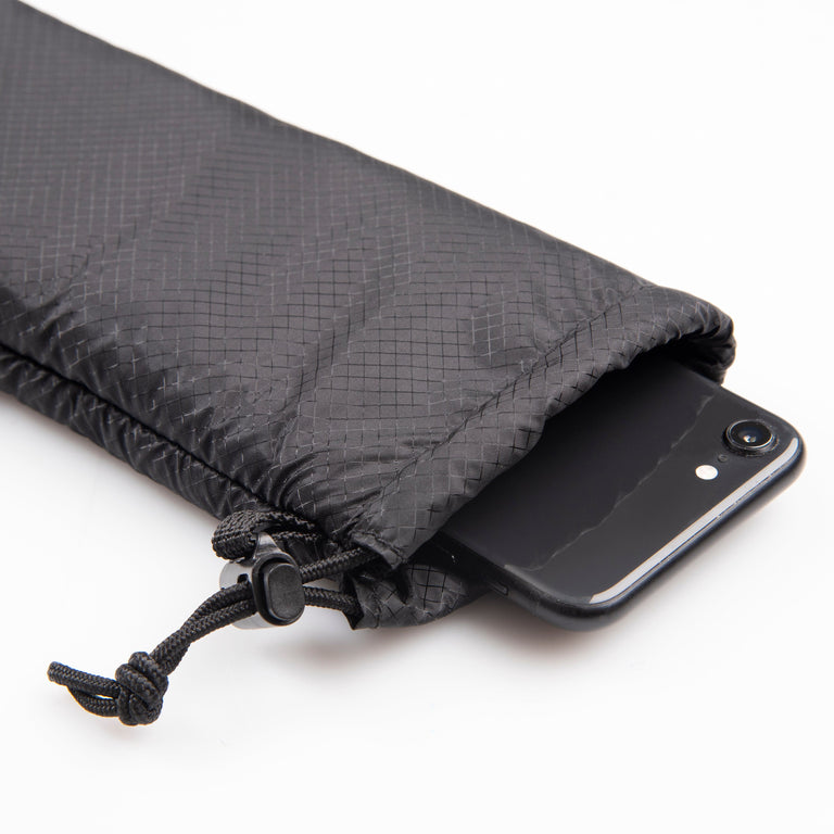 alpkit padded cell 3 small fleece lined accessory pouch in black with phone