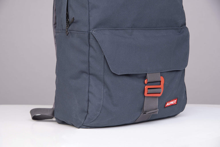 Alpkit pelmo wax cotton pack in denim outside pocket - closed
