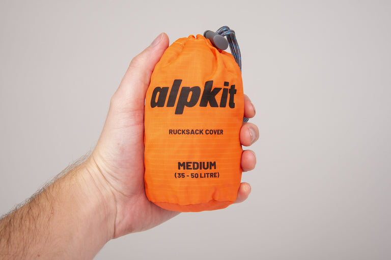 alpkit rucksack cover in orange small 35-50 litre