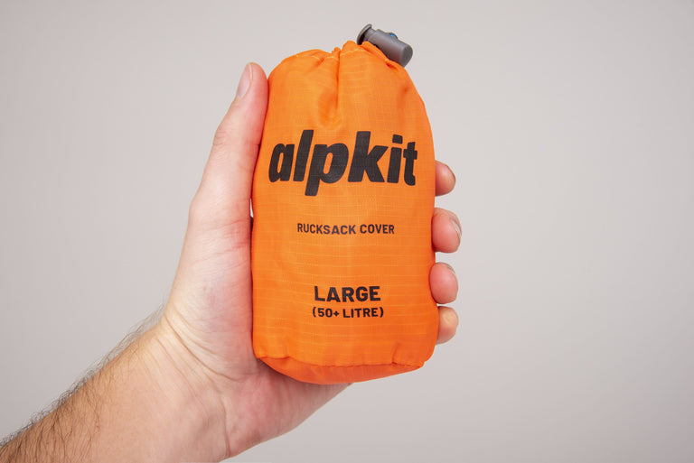 alpkit rucksack cover in orange small 50+ litre