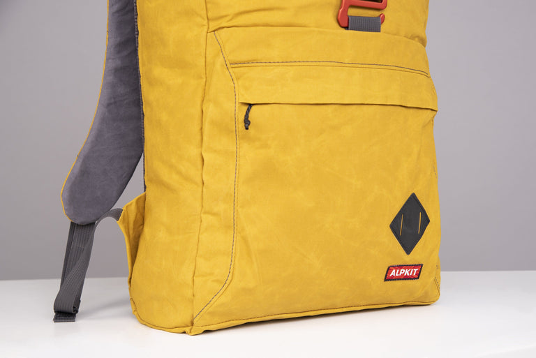 Alpkit tyrol wax cotton pack in mustard outside pocket - closed